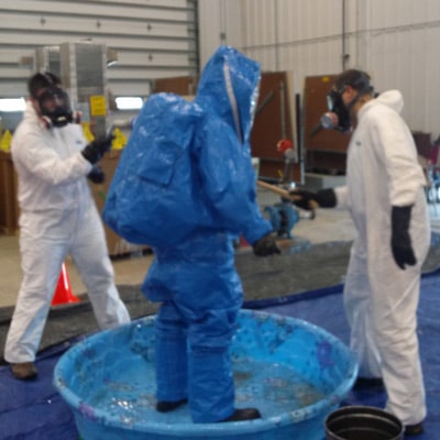 blue hazmat suit decontamination